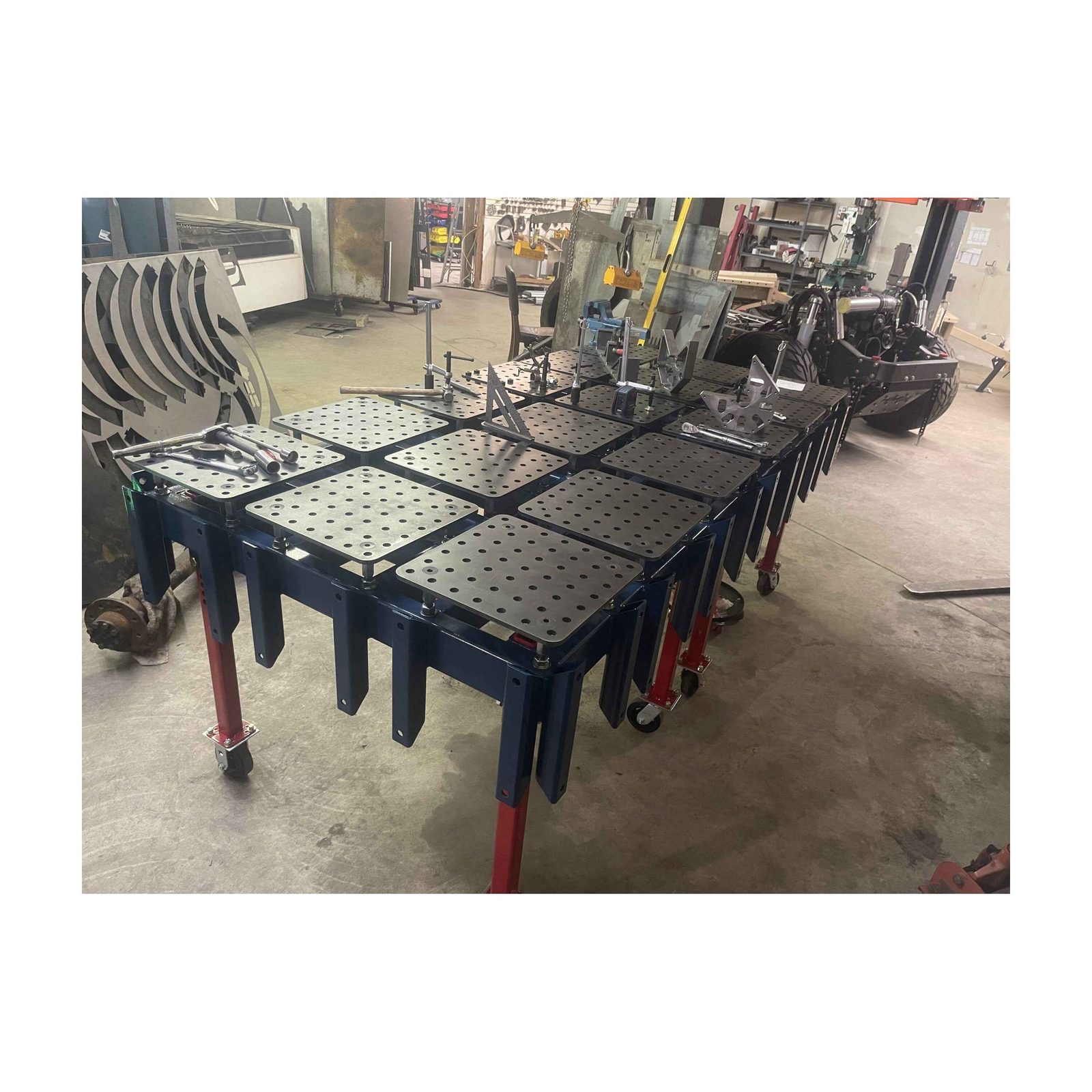 Patriot Chassis full manufacturing facility &mdash; laser cutter, press brake, and welding fixtures